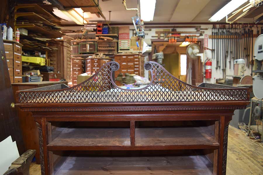 Repair and conservation services for antiques.